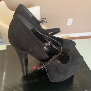 Black suede pumps